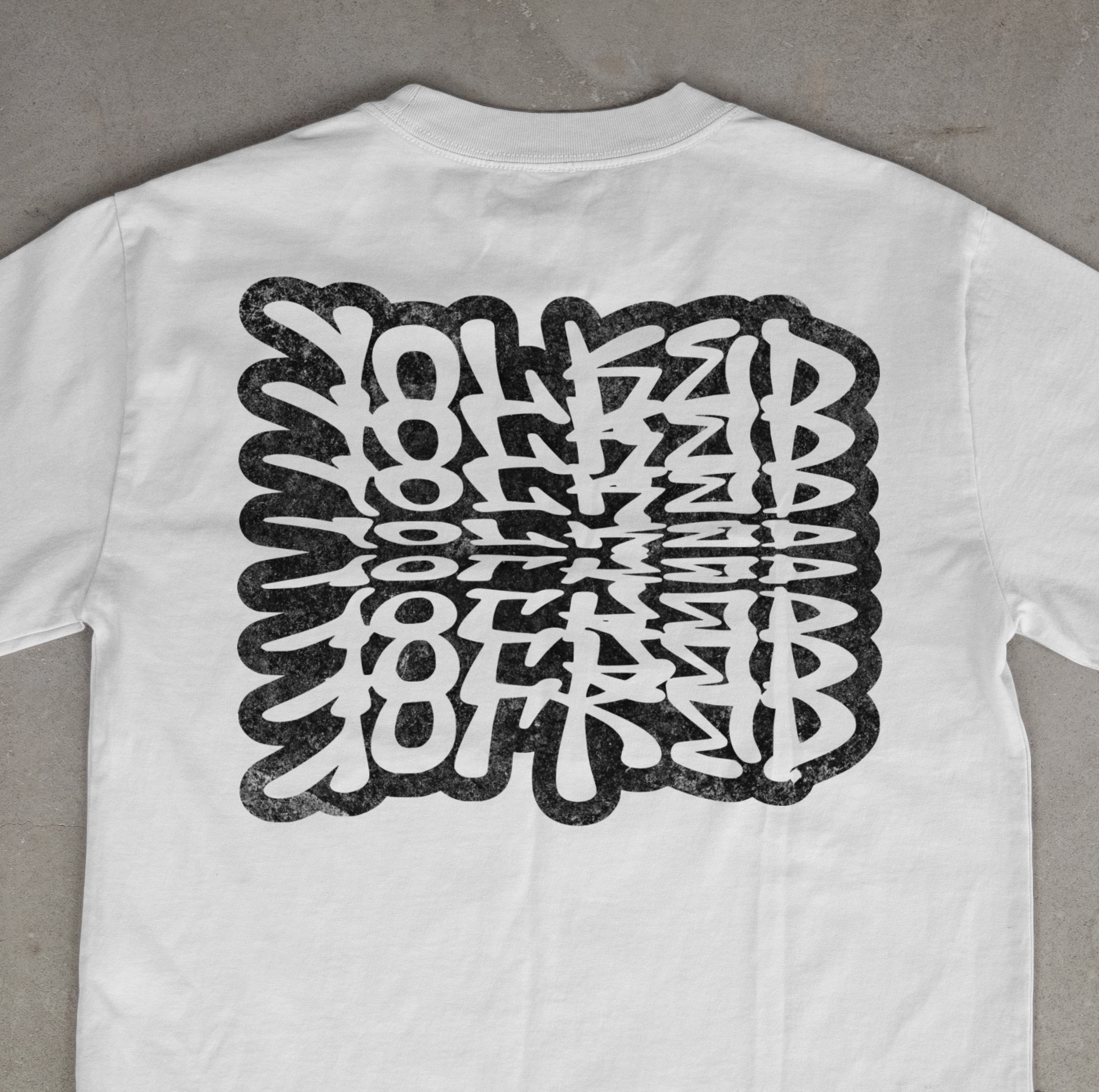Yolked Apparel Shirt – Optical Illusion Typography Tee, Graphic T-Shirt, Repeating Text Unisex Streetwear