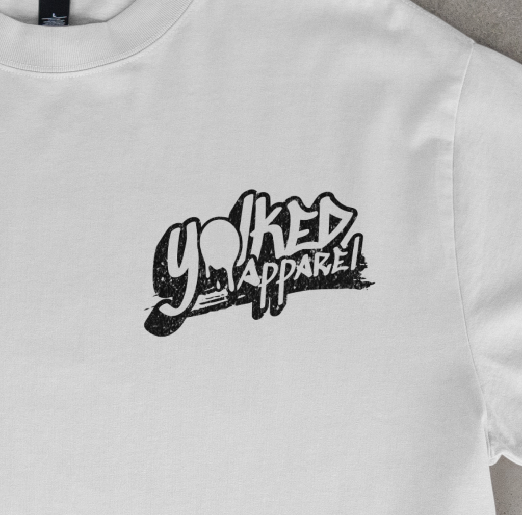 Yolked Apparel Shirt – Optical Illusion Typography Tee, Graphic T-Shirt, Repeating Text Unisex Streetwear