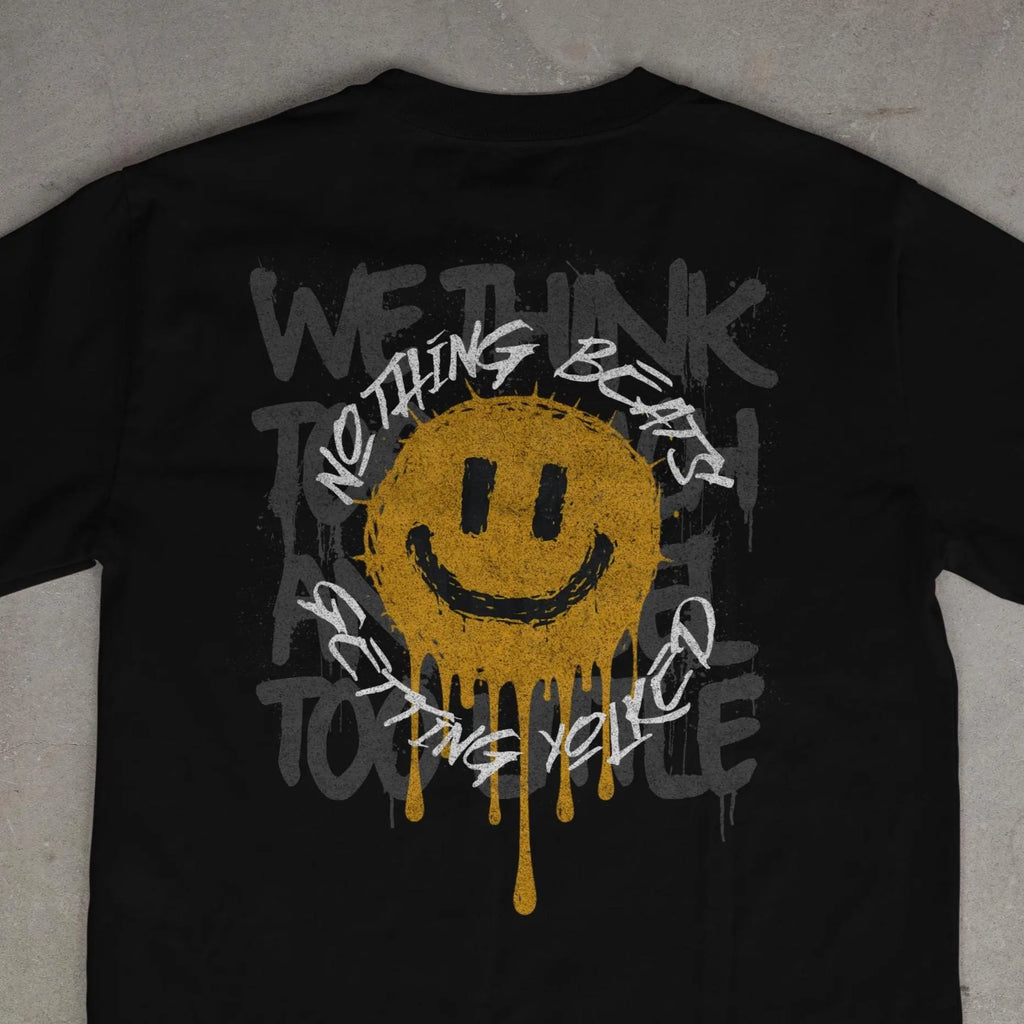 Nothing Beats Getting Yolked – Drip Smiley Graphic Tee